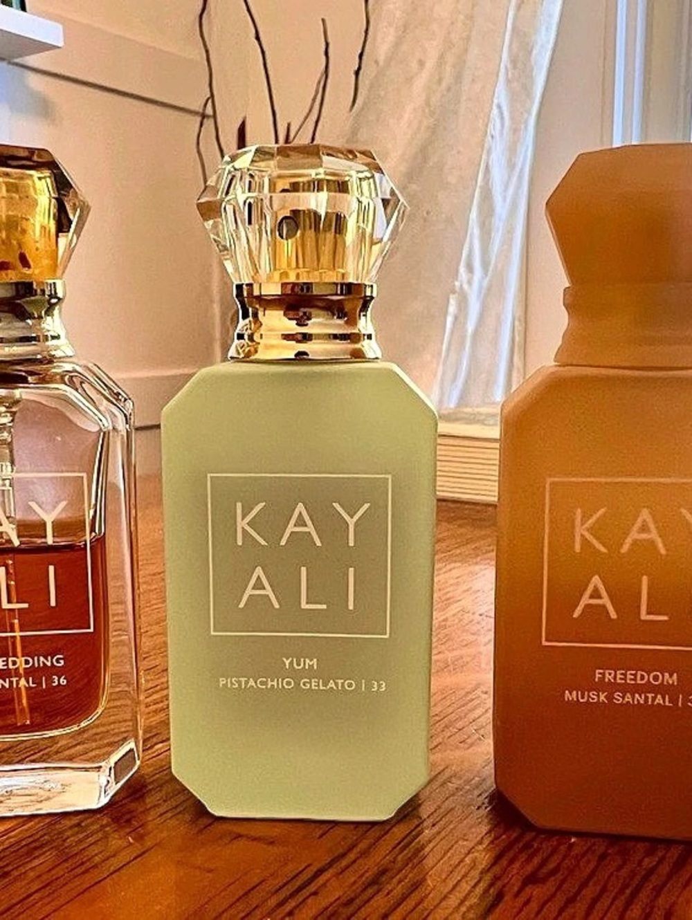 KAYALI fragrance trio: The Wedding Silk Santal | 36, Yum Pistachio Gelato | 33